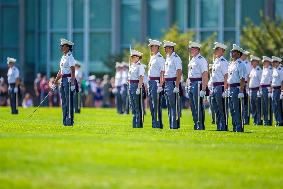 Cadets lined up in a field at West Point Academy